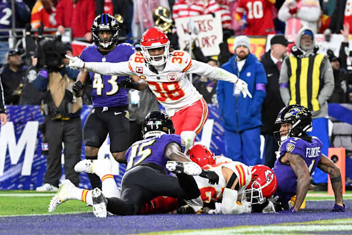 Kansas City Chiefs cornerback L'Jarius Sneed (38) celebrates as cornerback Trent McDuffie (22) recovers a fumble against Baltimore Ravens wide receiver Zay Flowers (4) and wide receiver Nelson Agholor (15) for a turnover during the second half in the AFC Championship football game at M&T Bank Stadium in Baltimore on Jan. 28, 2024.